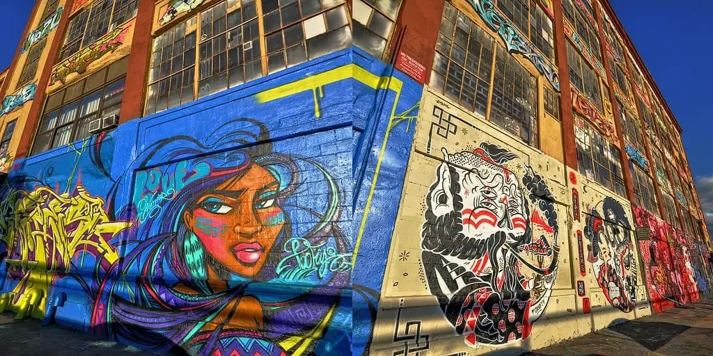 Detailed graffiti mural at 5 Pointz, woman